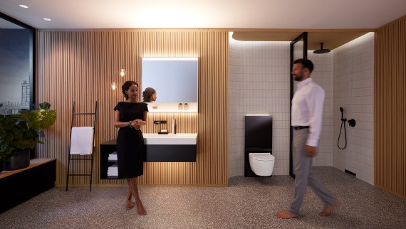 Muškarac i žena u savršeno osvijetljenoj kupaonici s Geberit ONE kupaonskim namještajem i keramikom (© Geberit) Muškarac i žena u savršeno osvijetljenoj kupaonici s Geberit ONE kupaonskim namještajem i keramikom (© Geberit)