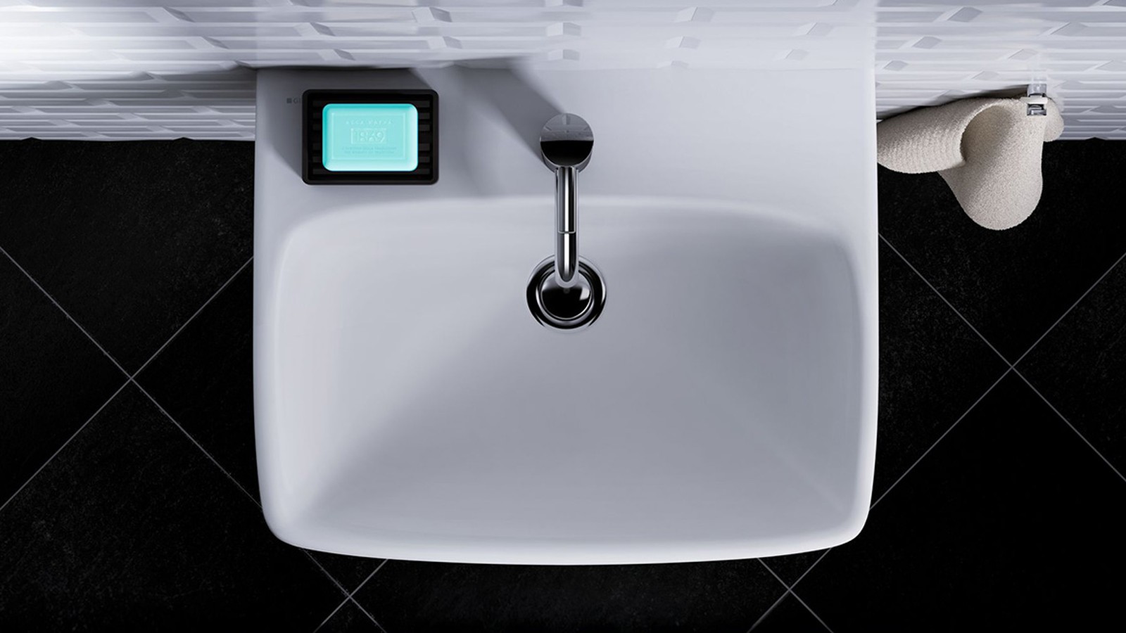 Pogled na umivaonik manjih dimenzija, slikano odozgo Pogled na umivaonik manjih dimenzija, slikano odozgo